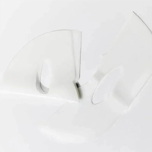 Feuille du masque Biodance Hydro Cera-nol dépliée, découpes du visage visibles