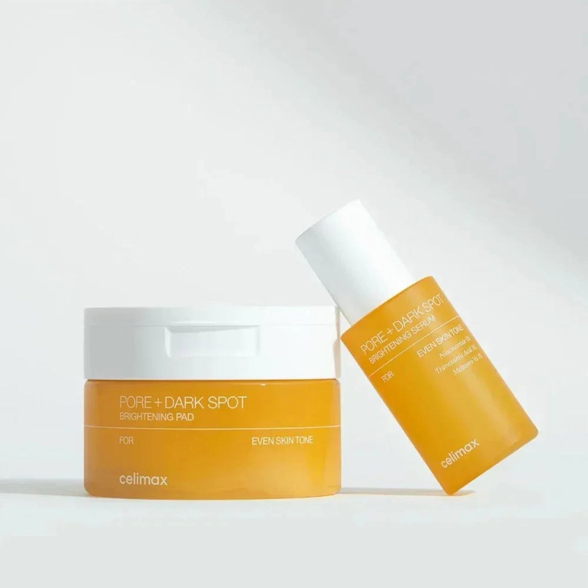 Pot des pads Celimax Pore+Dark Spot Brightening à côté du sérum de la même gamme